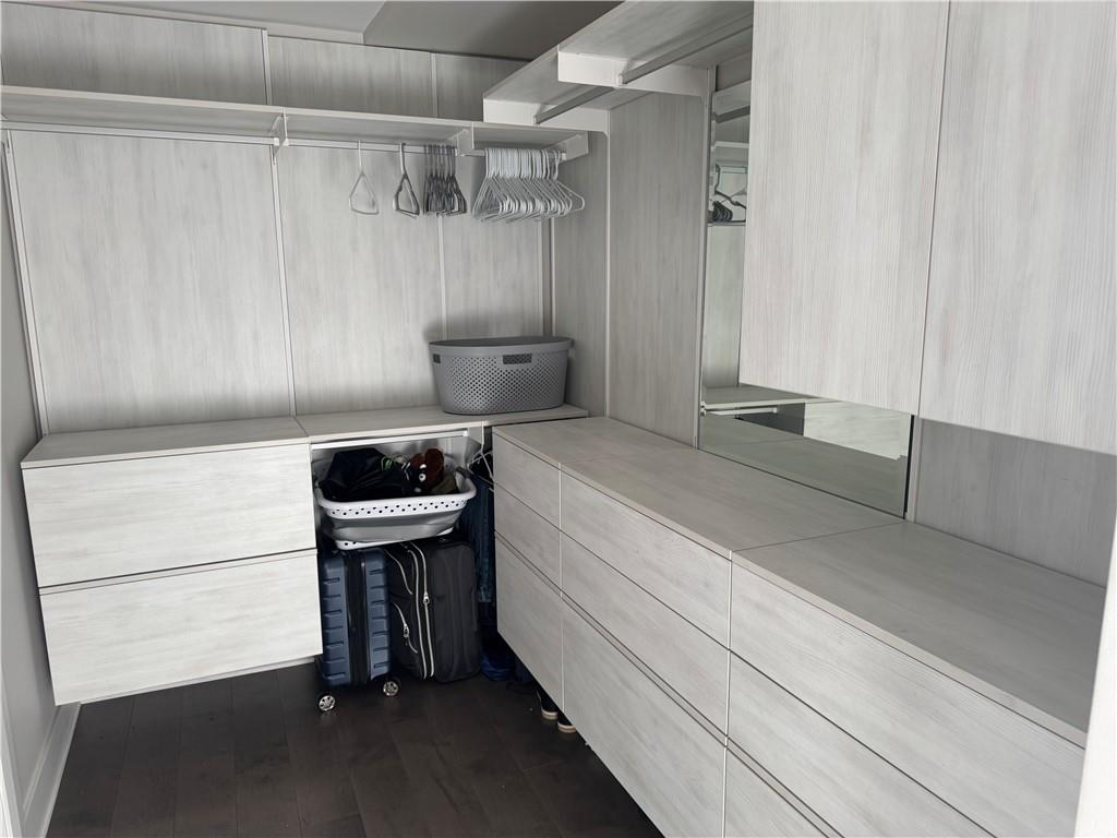 306 Fourth Avenue, Unit 1602 Pittsburgh, PA 15222 - Photo 24 of 31 a bathroom with a sink a toilet and a shower