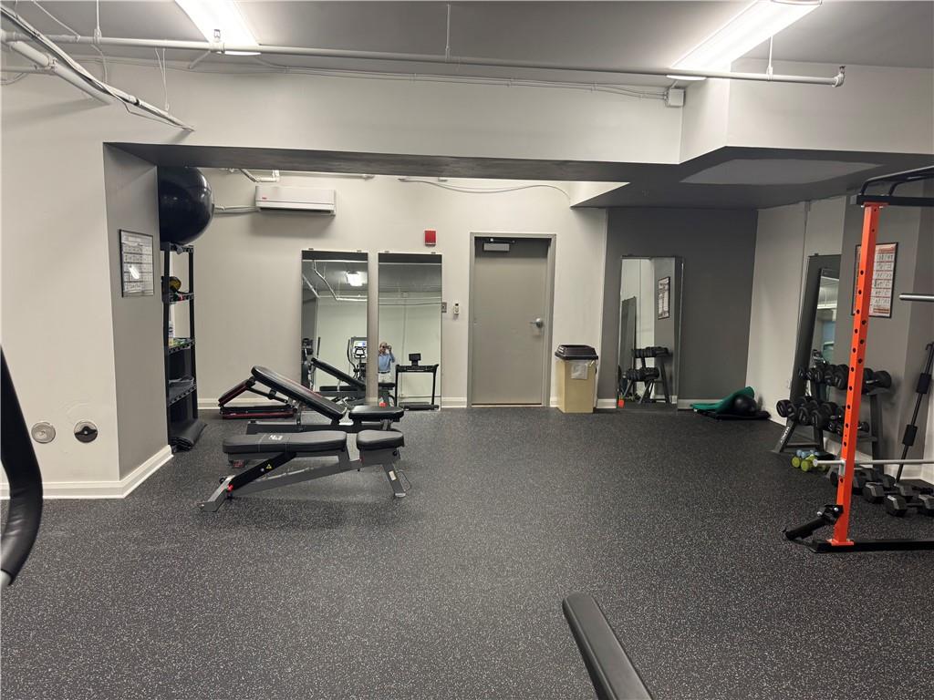 306 Fourth Avenue, Unit 1602 Pittsburgh, PA 15222 - Photo 28 of 31 a view of a room with gym equipment