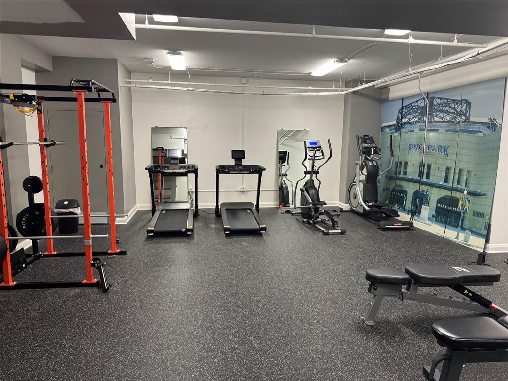 306 Fourth Avenue, Unit 1602 Pittsburgh, PA 15222 - Photo 30 of 31 a view of a room with gym equipment