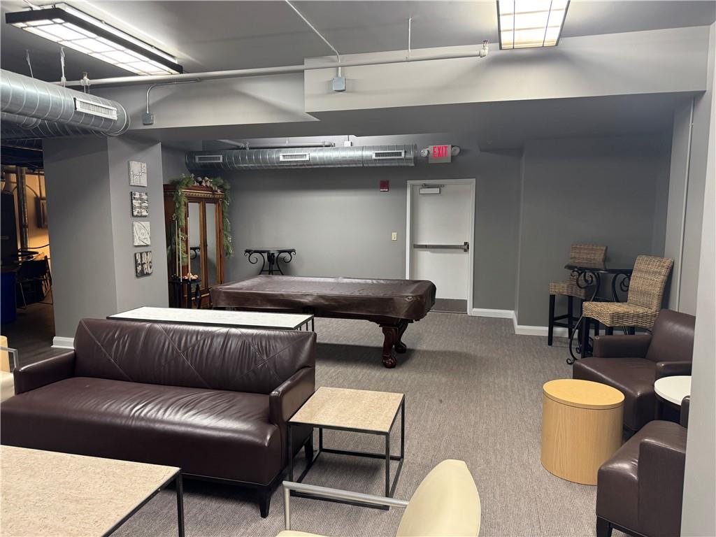 306 Fourth Avenue, Unit 1602 Pittsburgh, PA 15222 - Photo 31 of 31 a living room with furniture and a couch