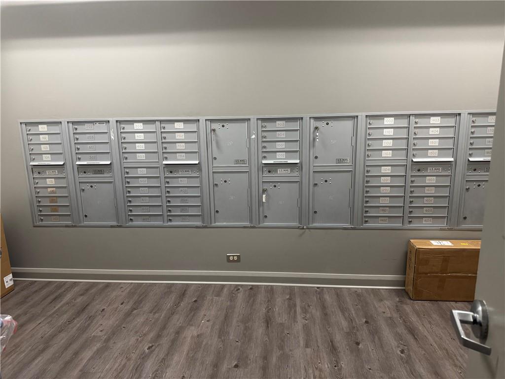 306 Fourth Avenue, Unit 1602 Pittsburgh, PA 15222 - Photo 6 of 31 a view of empty room with wooden floor and fan