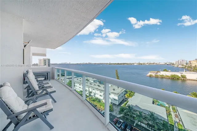 a view of a balcony with an ocean view