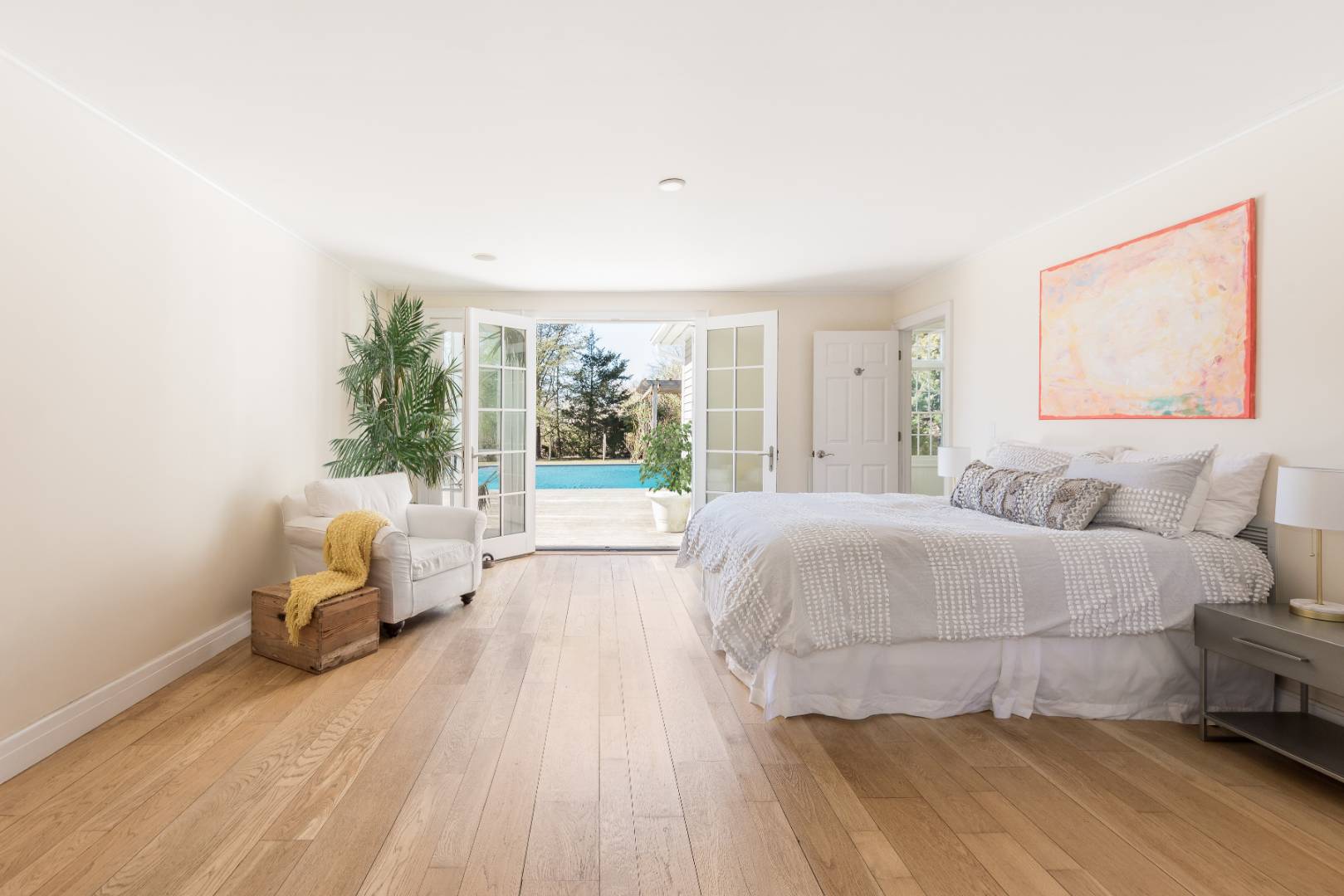 40 Williams Way Bridgehampton, NY 11932 - Photo 11 of 17 a spacious bedroom with a bed and window