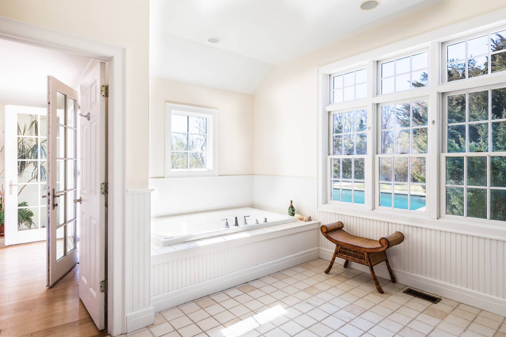 40 Williams Way Bridgehampton, NY 11932 - Photo 13 of 17 a bathroom with a bathtub and a window