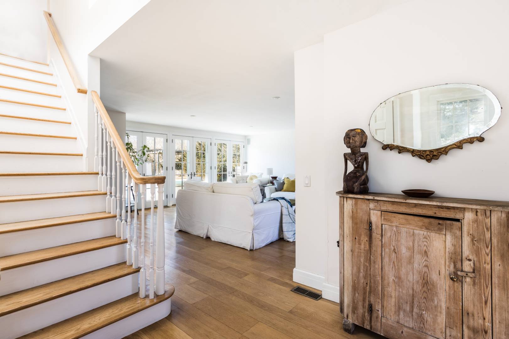 40 Williams Way Bridgehampton, NY 11932 - Photo 4 of 17 a living room with furniture and a wooden floor