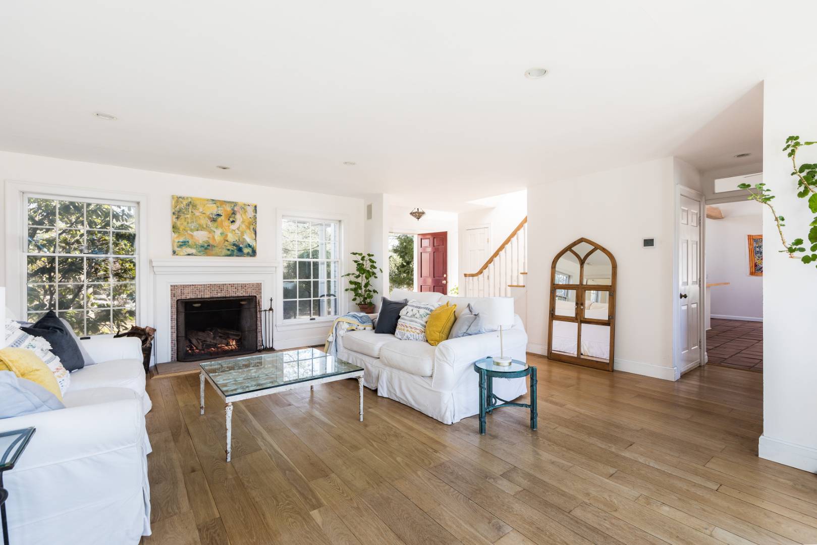 40 Williams Way Bridgehampton, NY 11932 - Photo 5 of 17 a living room with furniture a fireplace and a large window