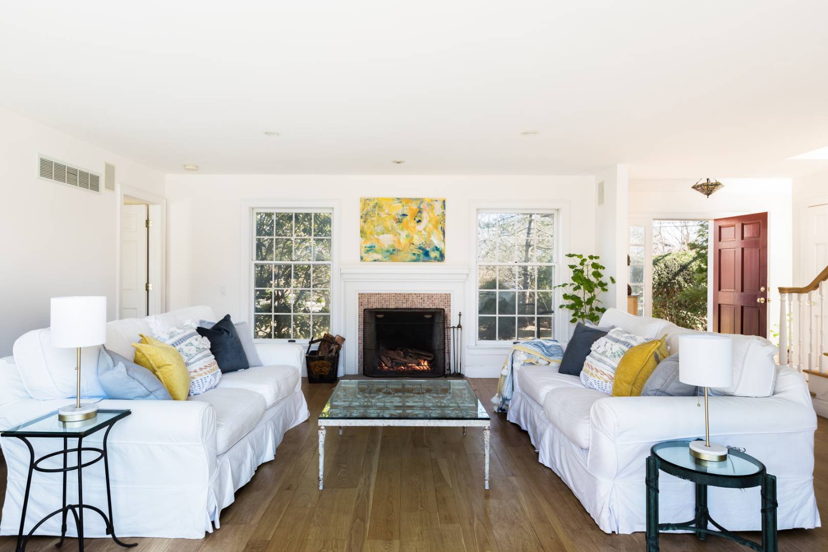 40 Williams Way Bridgehampton, NY 11932 - Photo 6 of 17 a living room with furniture and a fireplace