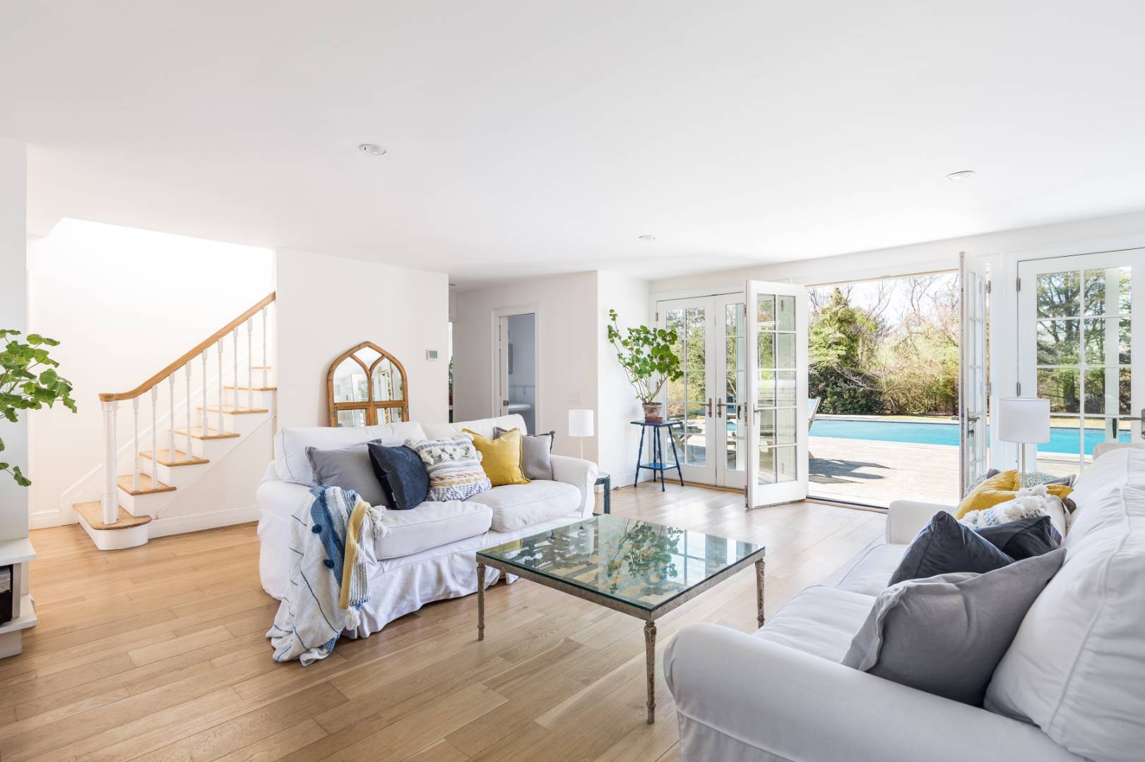 40 Williams Way Bridgehampton, NY 11932 - Photo 7 of 17 a living room with furniture and a large window