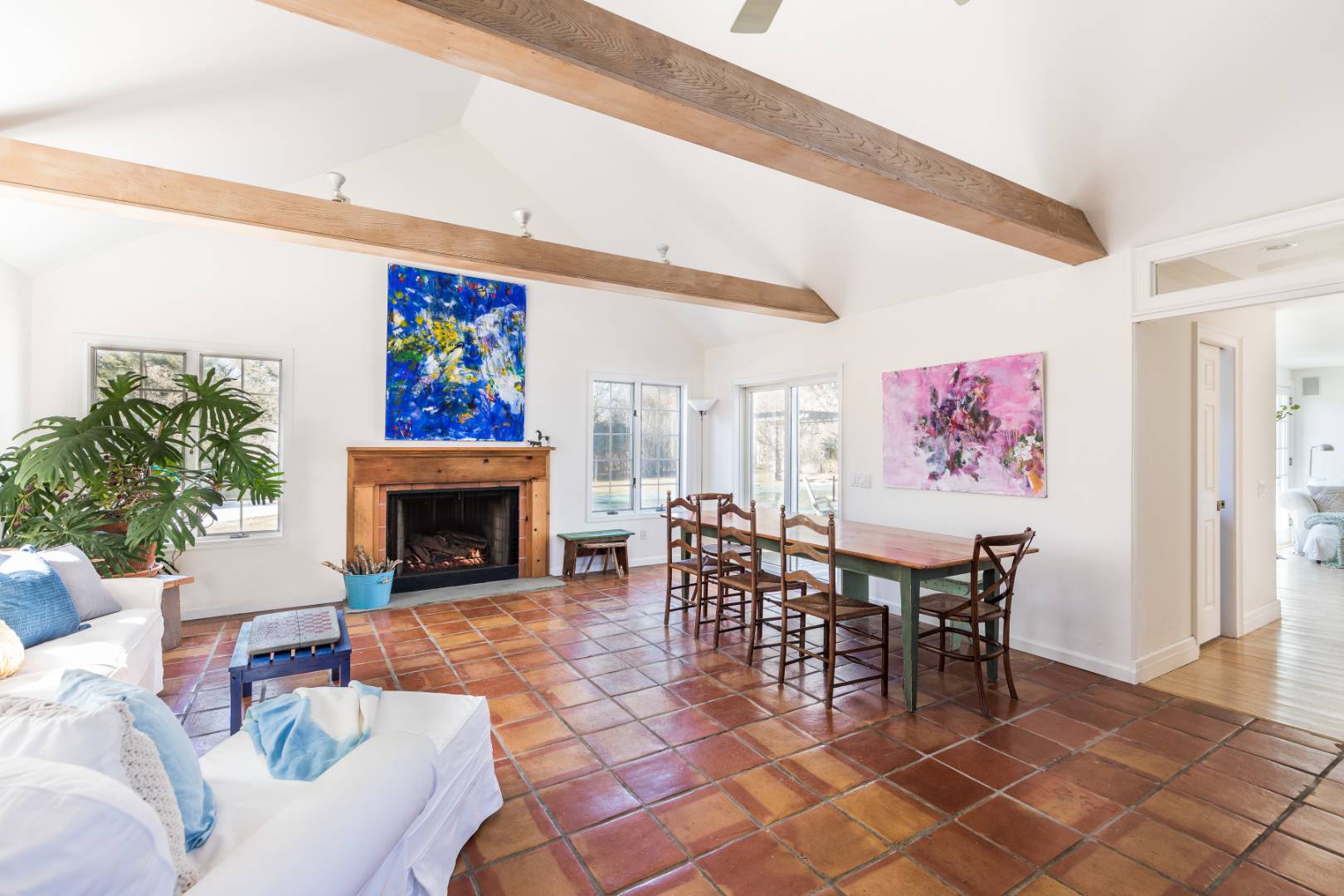 40 Williams Way Bridgehampton, NY 11932 - Photo 8 of 17 a living room with furniture a piano and a fireplace