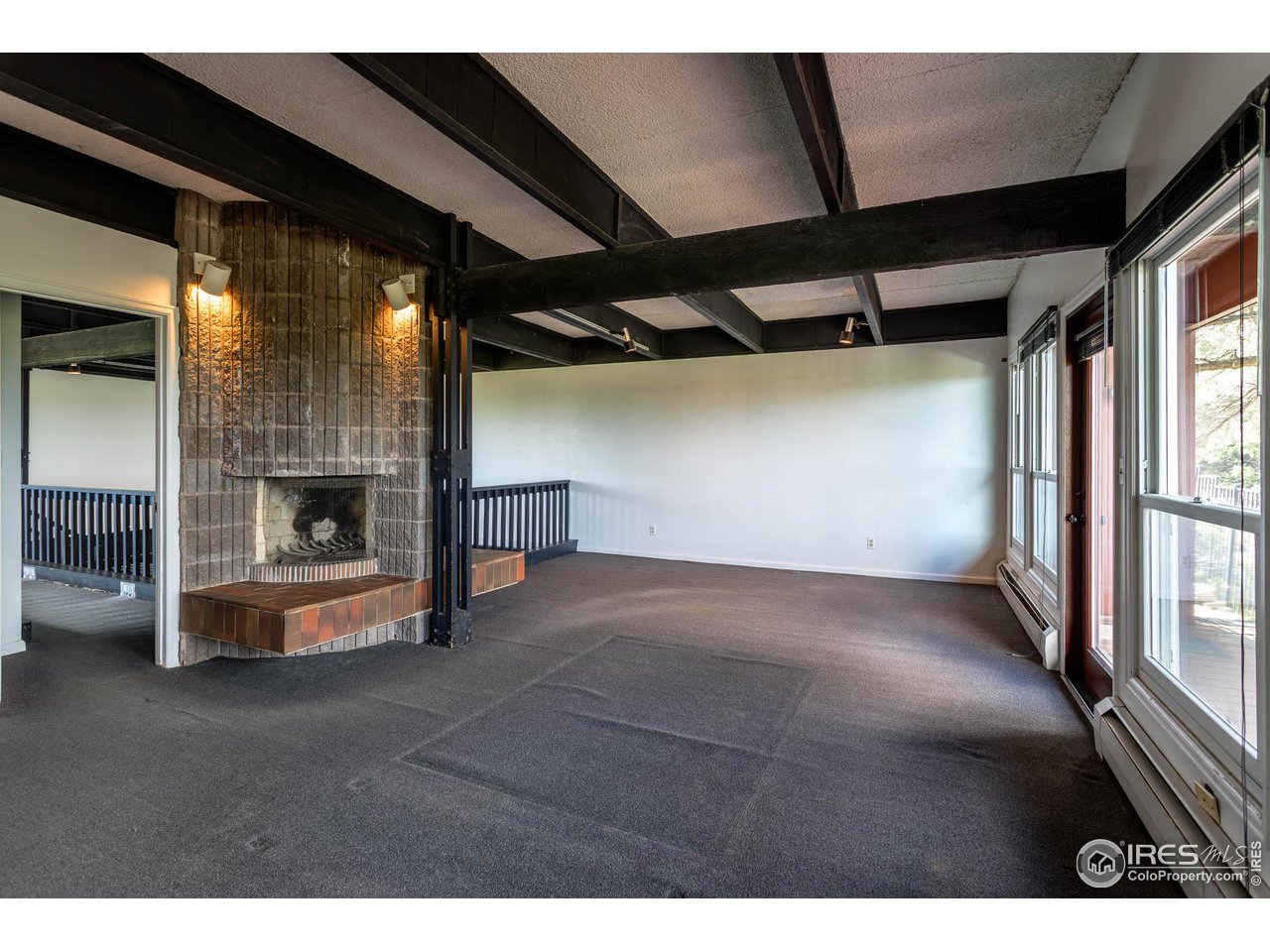 805 Circle Drive Boulder, CO 80302 - Photo 20 of 39 Fireplace in Primary Bedroom