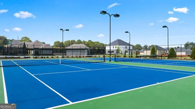 a view of swimming pool with a patio and a yard
