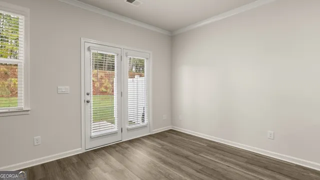 a house that has a garden in front of it