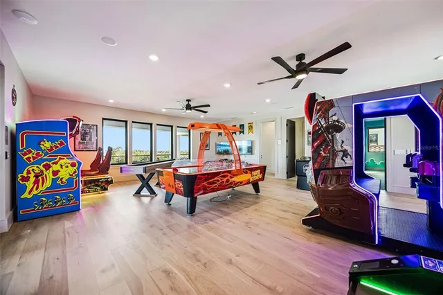 a kitchen with kitchen island granite countertop a sink stainless steel appliances and cabinets