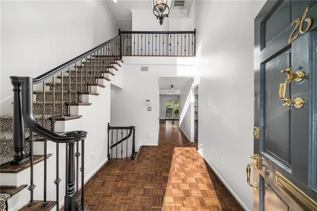 a view of a hallway view with staircase