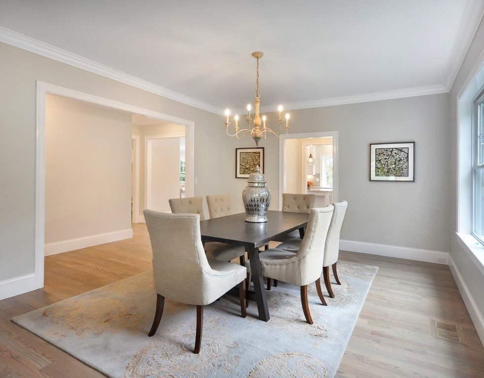 174 Wright Road Concord, MA 01742 - Photo 11 of 35 a view of a dining room with furniture and chandelier