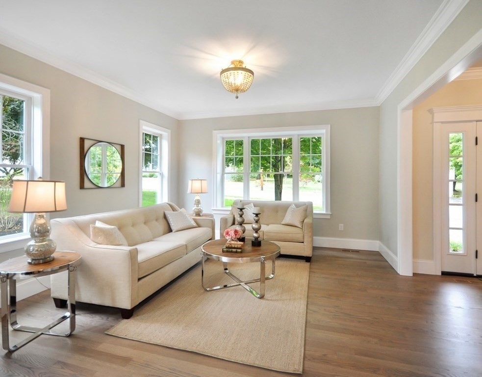 174 Wright Road Concord, MA 01742 - Photo 12 of 35 a living room with furniture and a large window