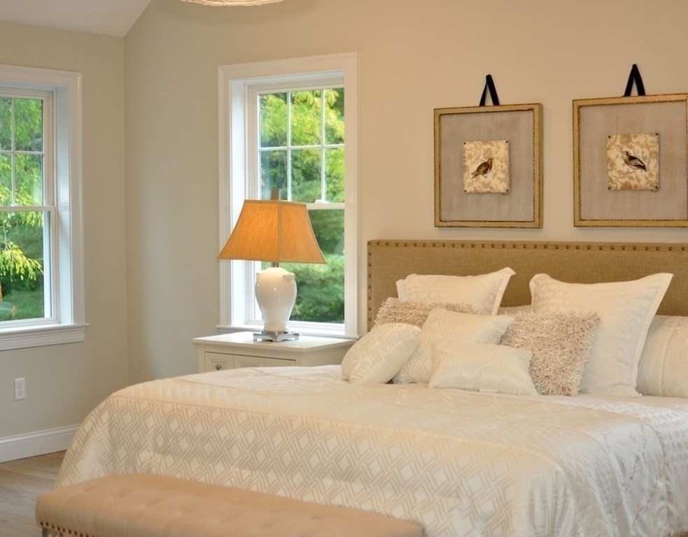 174 Wright Road Concord, MA 01742 - Photo 21 of 35 a bedroom with a bed and a window