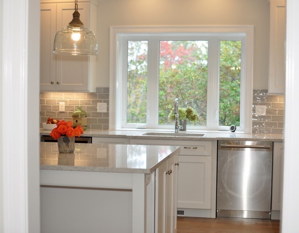 174 Wright Road Concord, MA 01742 - Photo 27 of 35 a kitchen with a sink and large window