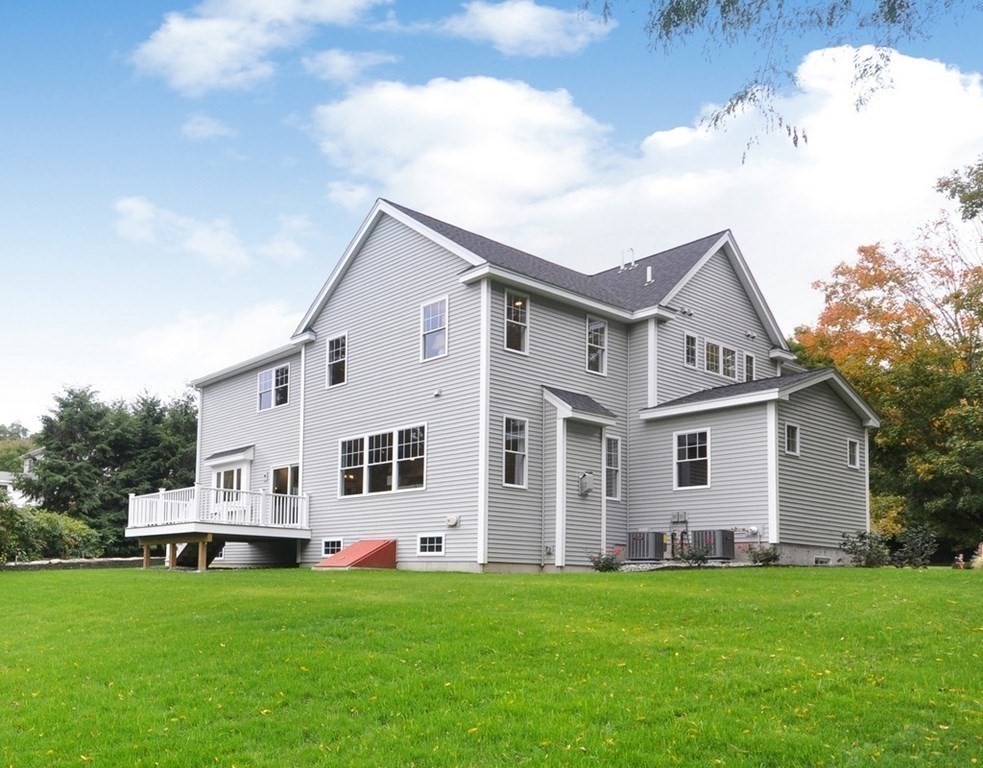 174 Wright Road Concord, MA 01742 - Photo 35 of 35 a view of a house with backyard