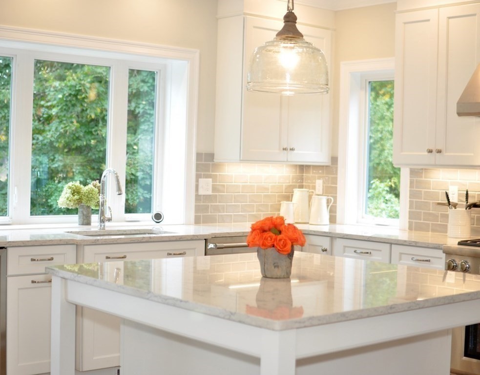 174 Wright Road Concord, MA 01742 - Photo 5 of 35 a kitchen with a window sink and cabinets