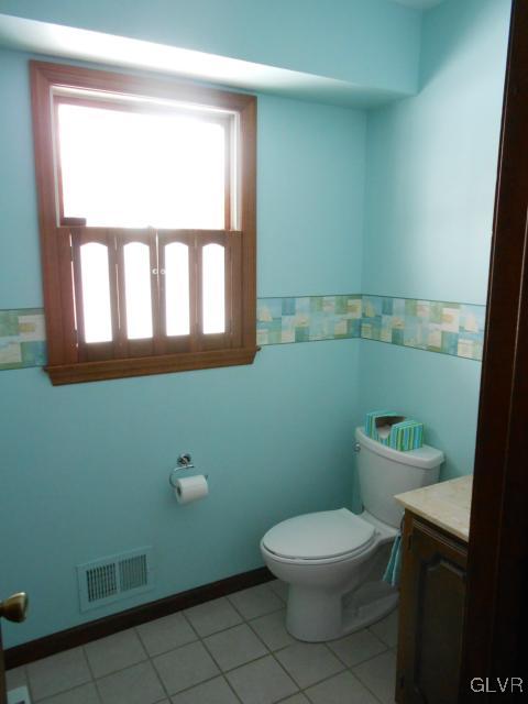 250 Ridgewood Road Easton, PA 18045 - Photo 16 of 21 a bathroom with a toilet a sink and a window