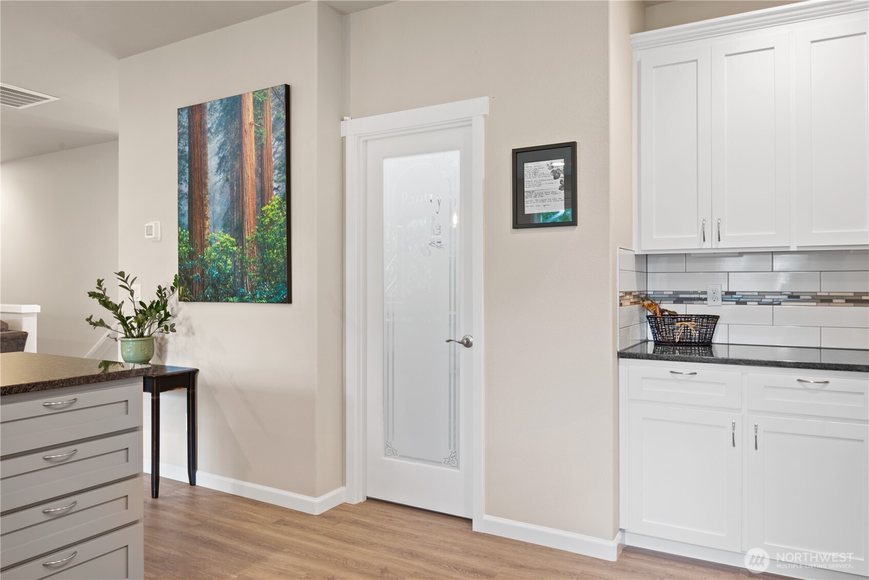 175 Shoreview Drive Kelso, WA 98626 - Photo 11 of 35 a kitchen with white cabinets and sink