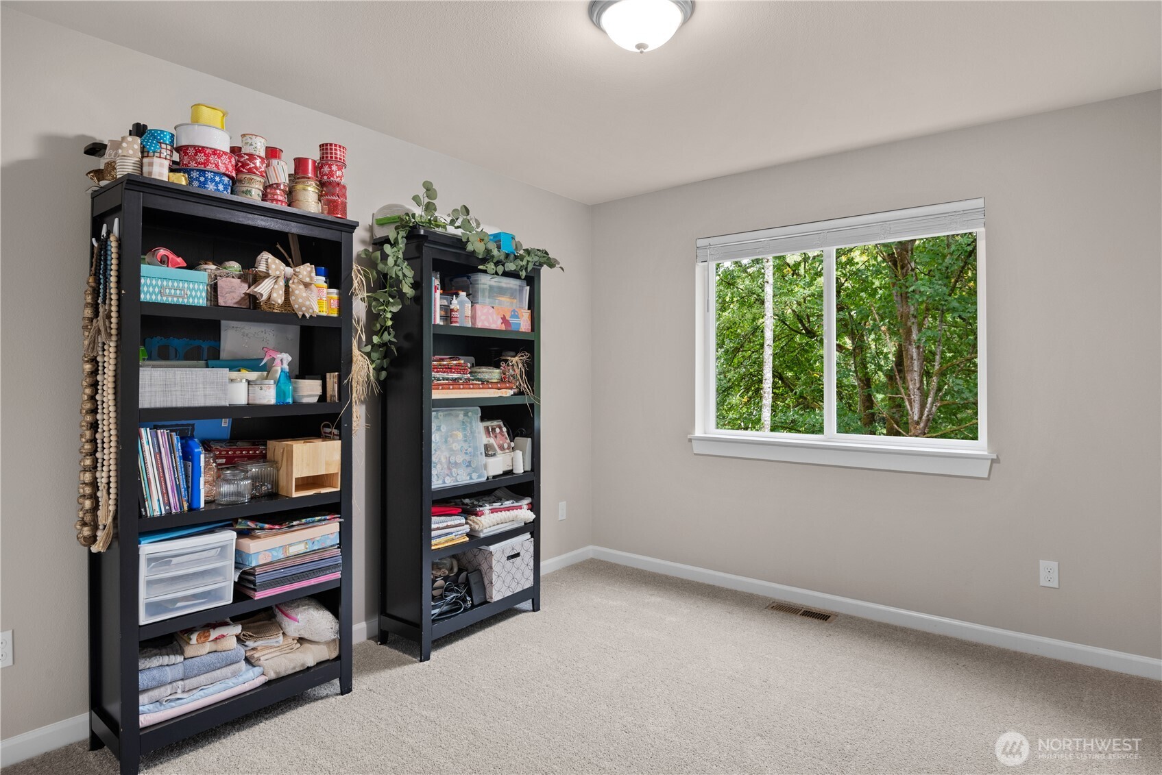 175 Shoreview Drive Kelso, WA 98626 - Photo 22 of 35 a room with book shelf and a window
