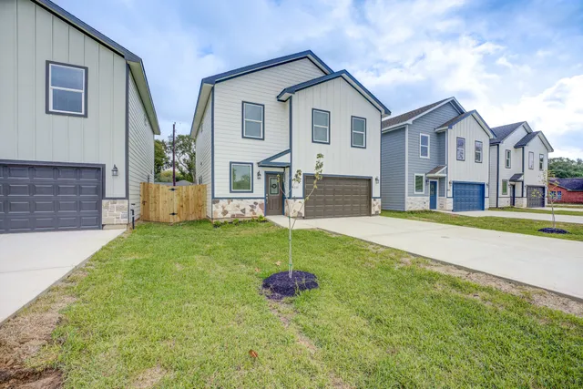 a house that has a big yard and more windows