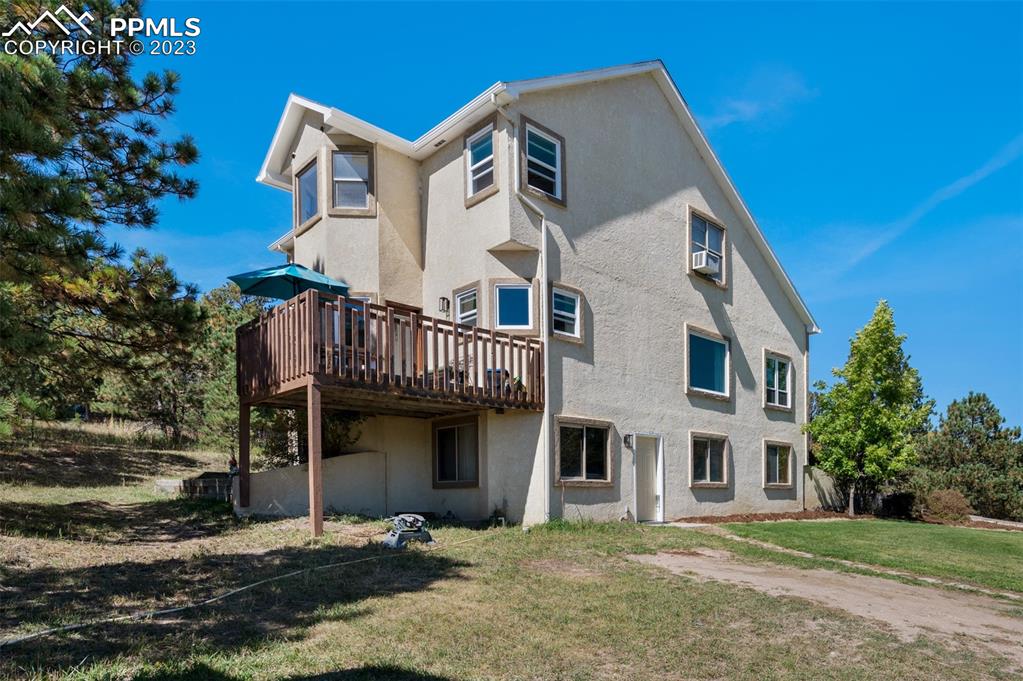 7425 Tobin Road Colorado Springs, CO 80908 - Photo 45 of 49 a front view of a house with a yard