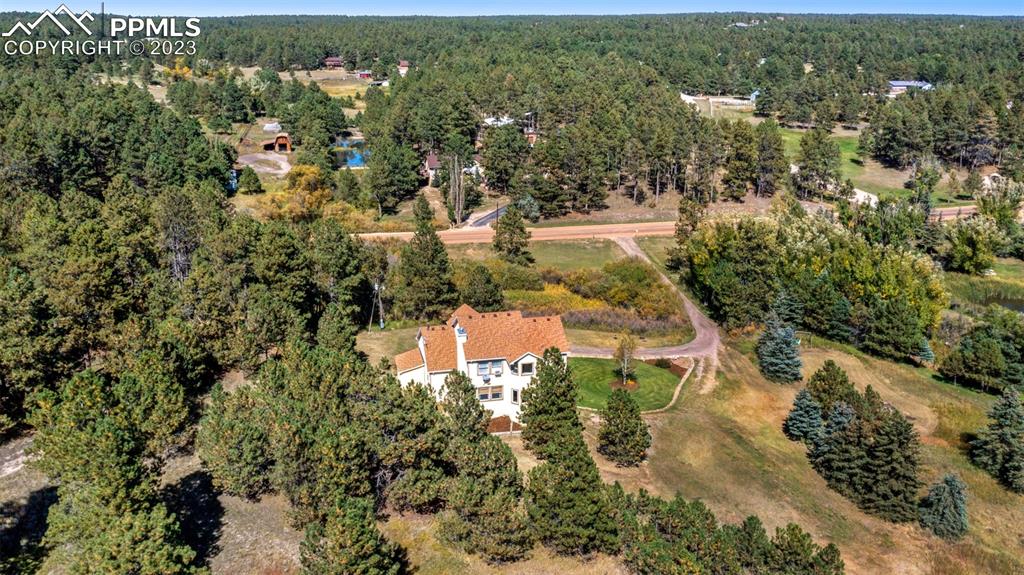 7425 Tobin Road Colorado Springs, CO 80908 - Photo 47 of 49 an aerial view of residential house with green space