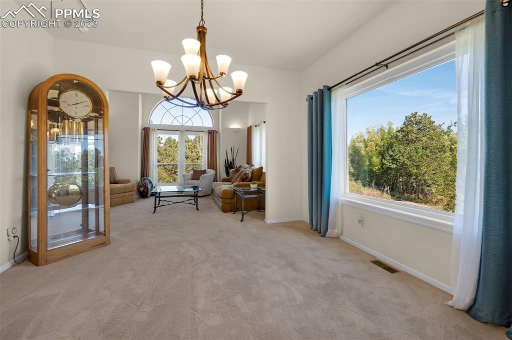 7425 Tobin Road Colorado Springs, CO 80908 - Photo 9 of 49 a view of a livingroom with furniture and window