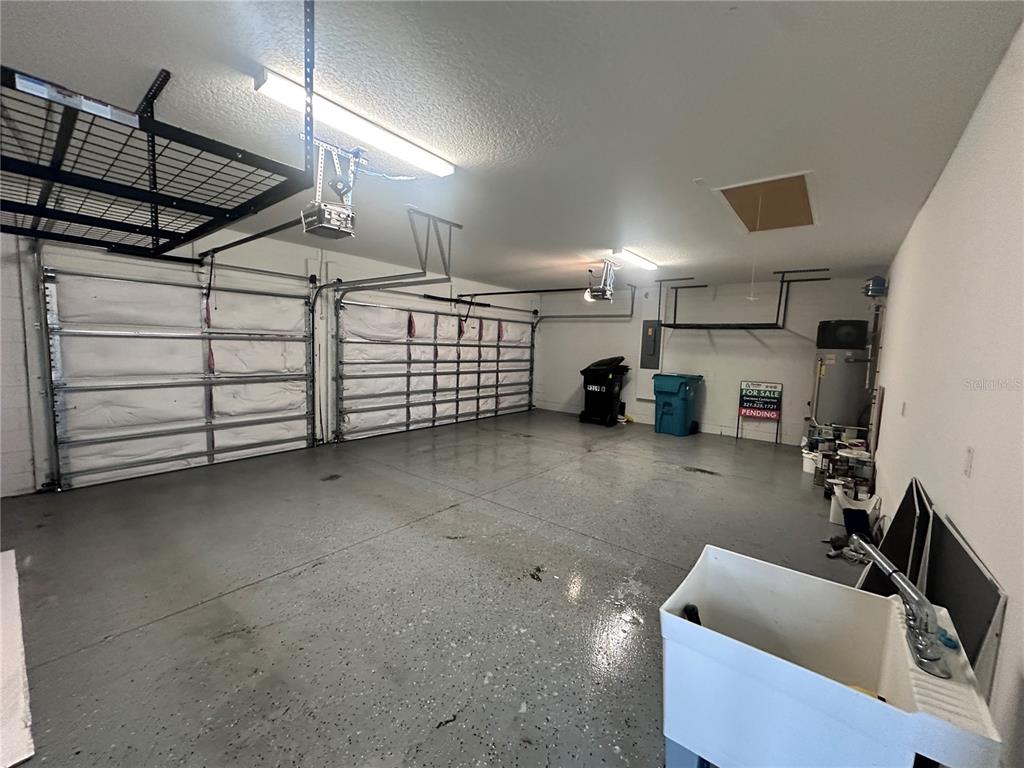 9319 Richet Place Orlando, FL 32827 - Photo 30 of 50 a view of a storage & utility room