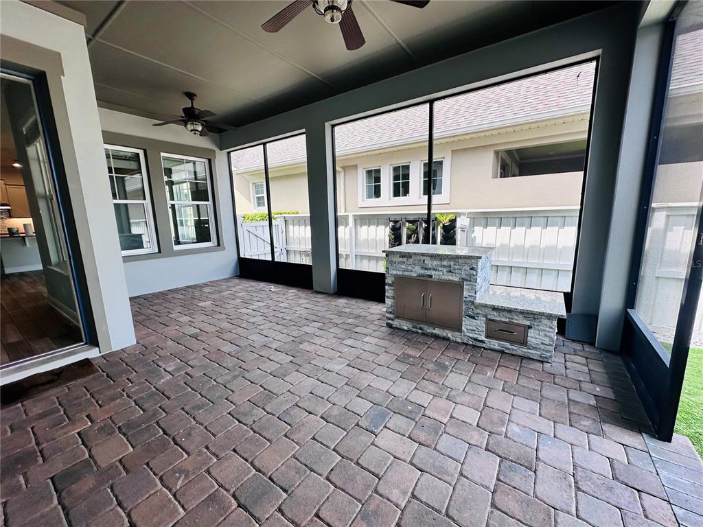 9319 Richet Place Orlando, FL 32827 - Photo 33 of 50 a living room with a large window
