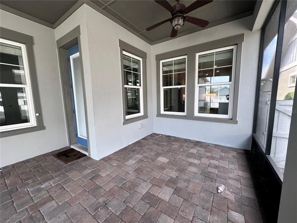 9319 Richet Place Orlando, FL 32827 - Photo 36 of 50 a view of an empty room with a window