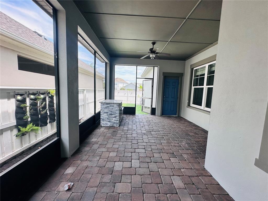 9319 Richet Place Orlando, FL 32827 - Photo 37 of 50 a view of a room with a large window