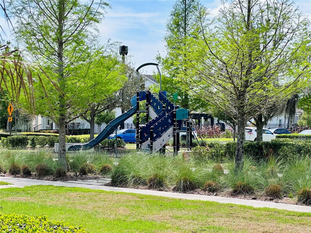 9319 Richet Place Orlando, FL 32827 - Photo 39 of 50 a view of a garden