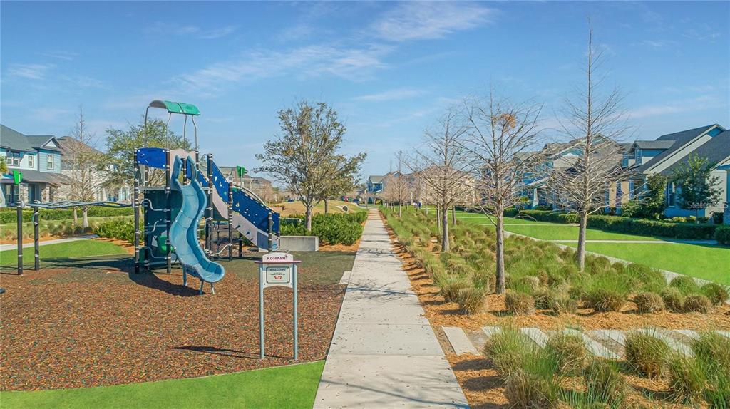 9319 Richet Place Orlando, FL 32827 - Photo 45 of 50 a view of a park with plants