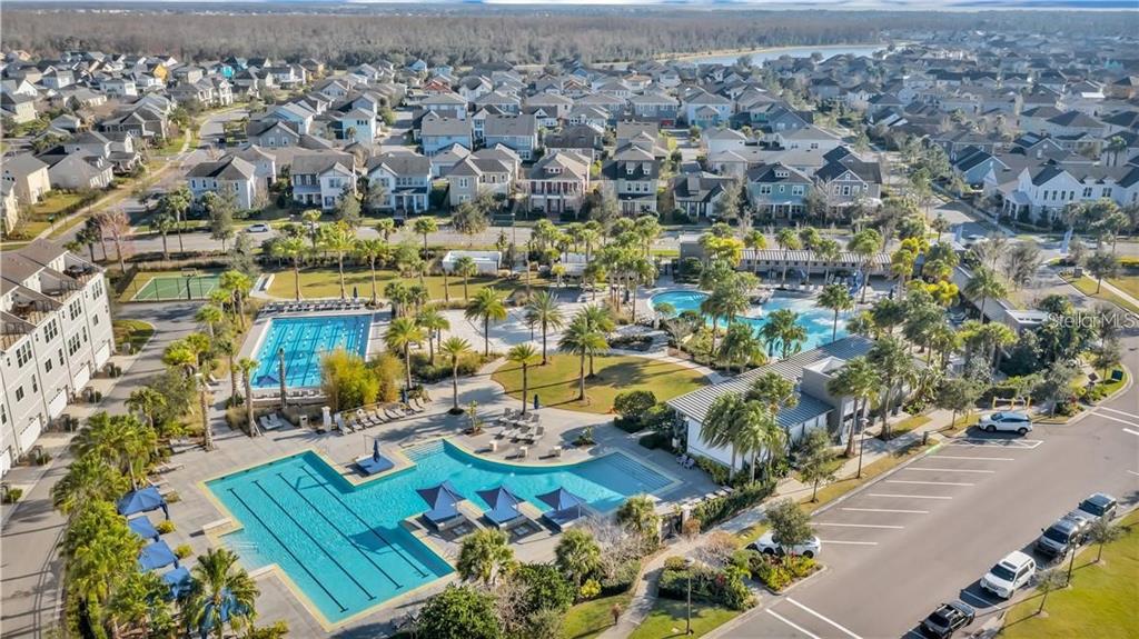 9319 Richet Place Orlando, FL 32827 - Photo 49 of 50 an aerial view of residential houses with outdoor space