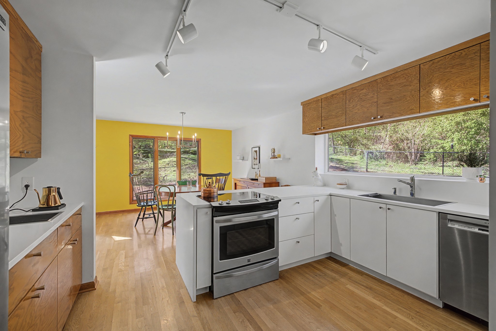 4677 Celeste Lane Franklin, TN 37064 - Photo 23 of 56 a kitchen with a stove a sink and a refrigerator