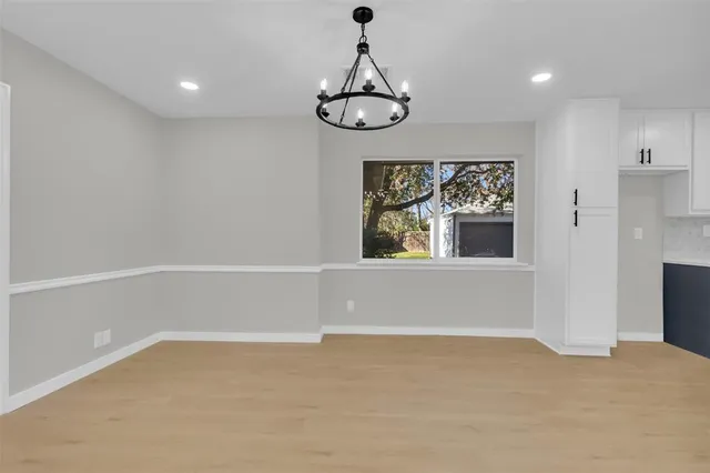 a view of an empty room with window