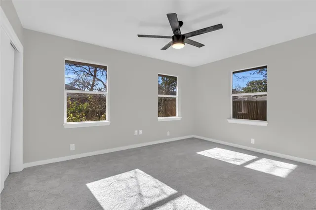 a view of a ceiling fan in a room