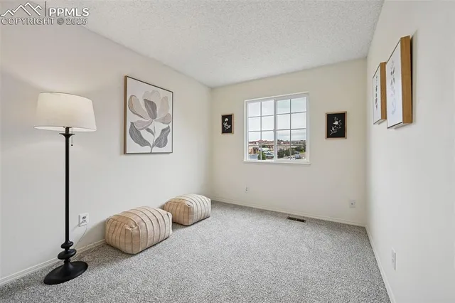 a room with a bed and a window