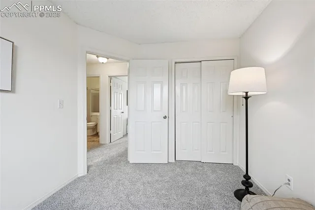 a view of a room with a wardrobe space