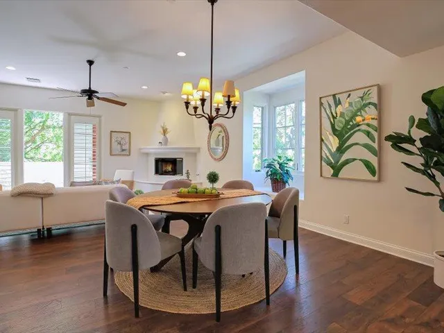 a kitchen with a sink a stove and cabinets