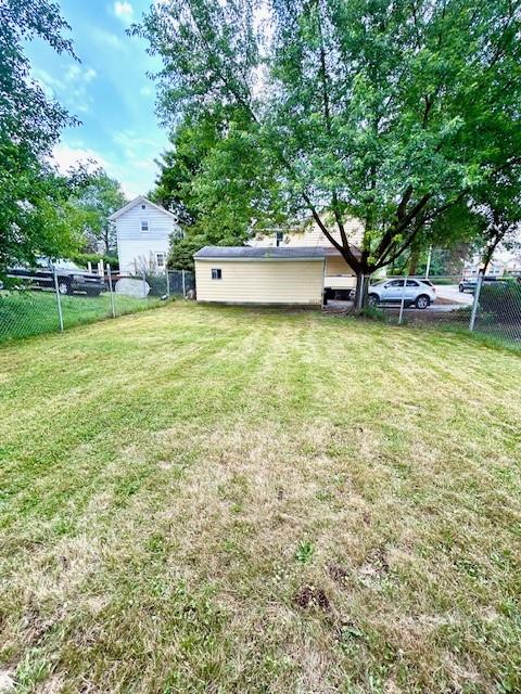 1201 Marshall Road Monaca, PA 15061 - Photo 11 of 35 a front view of a house with a garden and trees