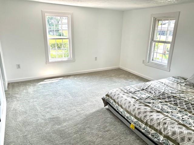 1201 Marshall Road Monaca, PA 15061 - Photo 28 of 35 a bed sitting in a bedroom next to a window