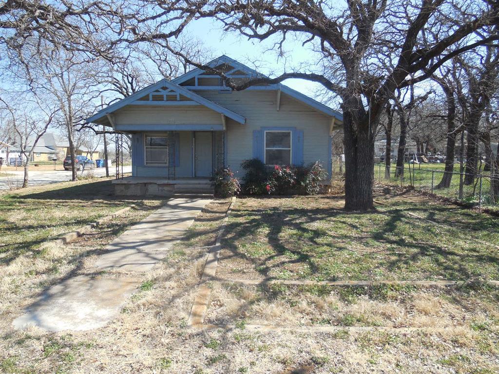 1100 Oddie Street Ranger, TX 76470 - Photo 1 of 1 a front view of a house with a yard