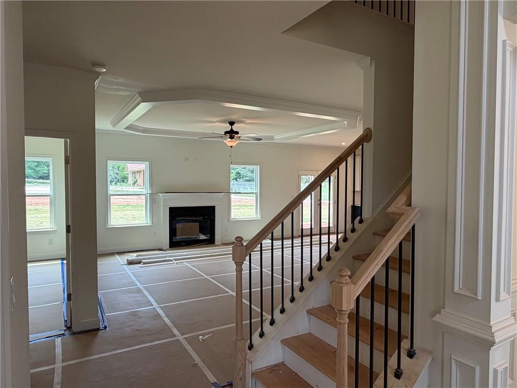 41 Woodland Road Covington, GA 30016 - Photo 2 of 46 a view of an entryway and livingroom with fireplace