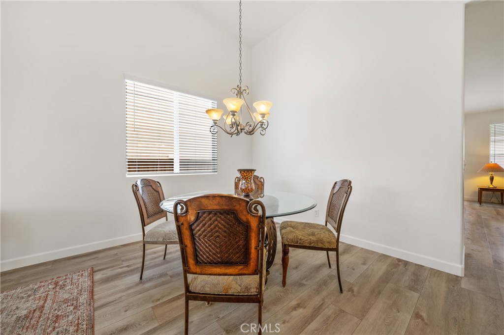 40889 Robards Way Murrieta, CA 92562 - Photo 12 of 36 a dining room with furniture and window