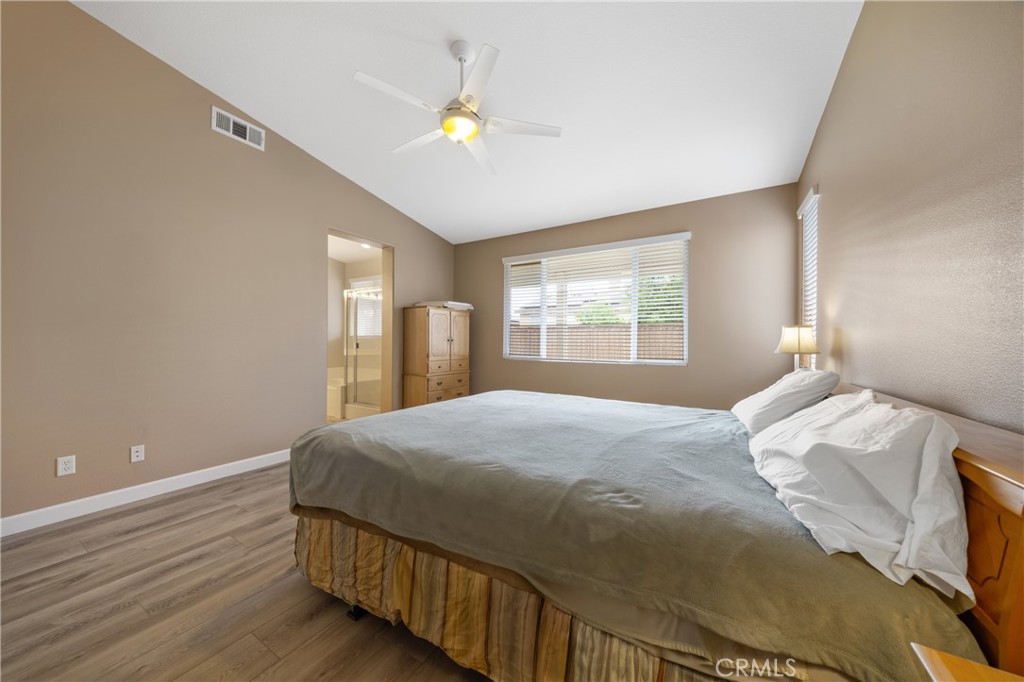 40889 Robards Way Murrieta, CA 92562 - Photo 18 of 36 a bedroom with a bed and a window